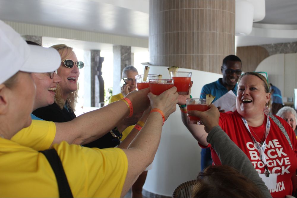 ALG Vacations travel advisors cheers RIU Negril